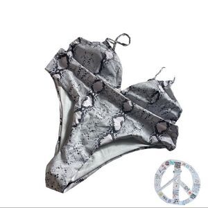 $5$ add on item$ Snakeskin print bikini. Size large. Untagged